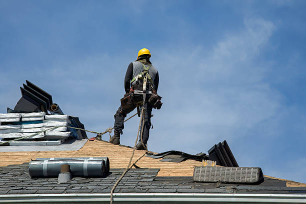Professional Gutter Installation technician working in Electric City, WA
